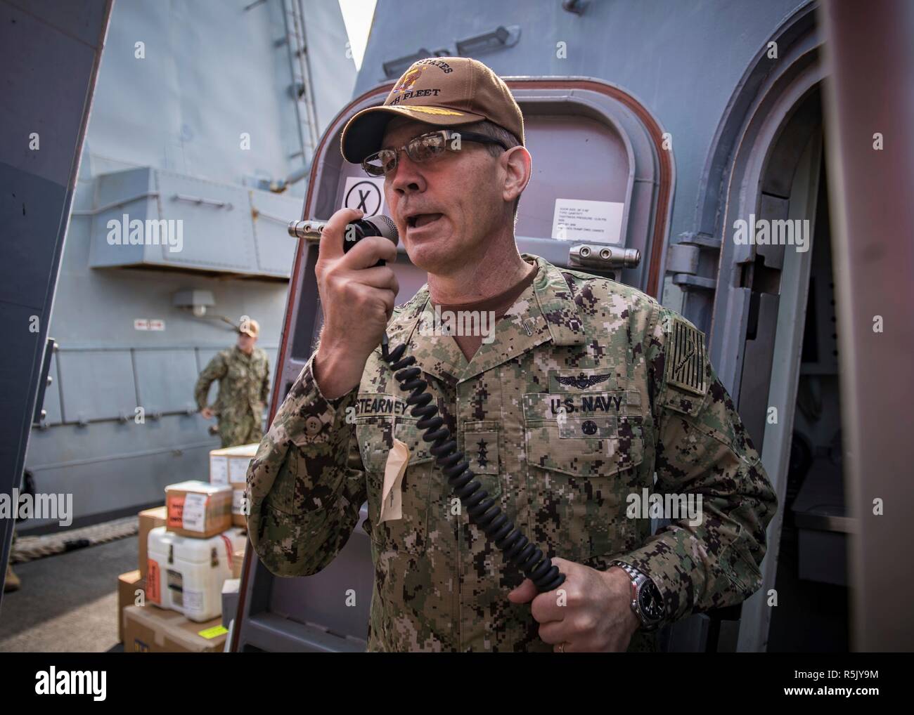 U.S. Navy Vice Adm. Scott Stearney, commander of U.S. Naval Forces Central Command speaks on the 1MC shipboard intercom to welcome the crew of the guided-missile destroyer USS Jason Dunham October 24, 2018 in Manama, Bahrain. Vice Admiral Scott Stearney was found dead in his residence in Bahrain on December 1, 2018 of suicide. Stock Photo