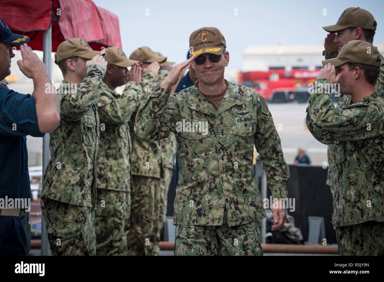 U.S. Navy Vice Adm. Scott Stearney, commander of U.S. Naval Forces Central Command is saluted on the quarterdeck of the guided-missile destroyer USS Jason Dunham October 24, 2018 in Manama, Bahrain. Vice Admiral Scott Stearney was found dead in his residence in Bahrain on December 1, 2018 of suicide. Stock Photo