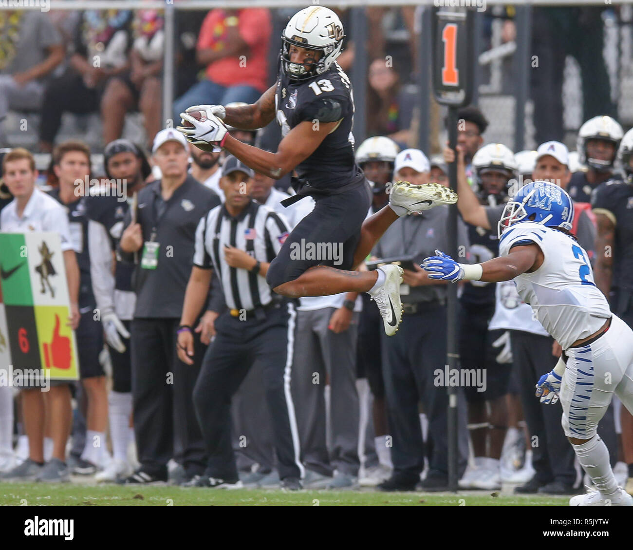 Orlando, Florida, USA. 1st Dec, 2018. UCF WR Gabriel Davis #13 jumps up to grab a pass during the AAC Football Championship game between the Memphis Tigers and the UCF Knights at Spectrum Stadium in Orlando, Florida. Kyle Okita/CSM/Alamy Live News Stock Photo