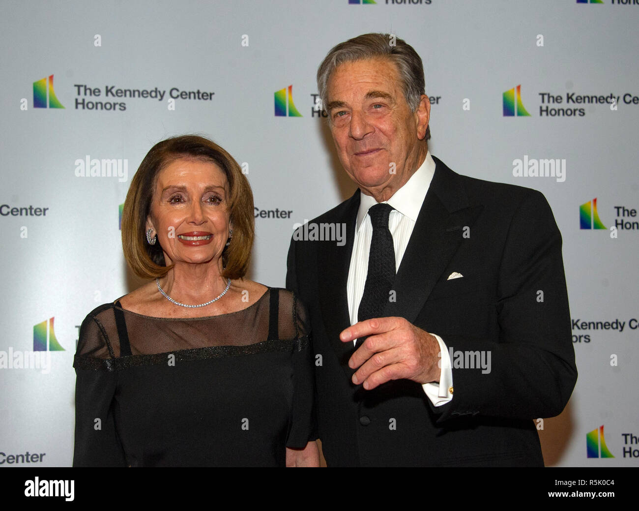Washington DC, USA. 1st XDecember, 2018. United States House Minority Leader Nancy Pelosi (Democrat of California) and her husband, Paul, arrive for the formal Artist's Dinner honoring the recipients of the 41st Annual Kennedy Center Honors hosted by United States Deputy Secretary of State John J. Sullivan at the US Department of State in Washington, DC on Saturday, December 1, 2018. The 2018 honorees are: singer and actress Cher; composer and pianist Philip Glass; Country music entertainer Reba McEntire; and jazz saxophonist and composer Wayne Shorter. Credit: MediaPunch Inc/Alamy Live News Stock Photo