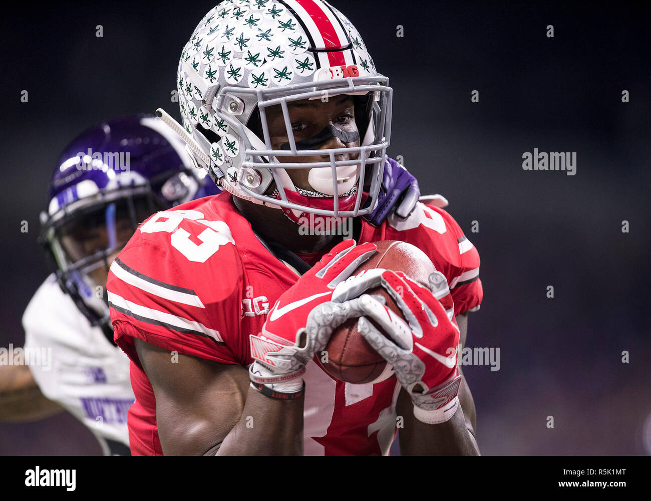 Indianapolis, Indiana, USA. 01st Dec, 2018. Ohio State wide receiver Terry McLaurin (83) catches touchdown pass during NCAA Football game action between the Northwestern Wildcats and the Ohio State Buckeyes at Lucas Oil Stadium in Indianapolis, Indiana. Ohio State defeated Northwestern 45-24. John Mersits/CSM/Alamy Live News Stock Photo