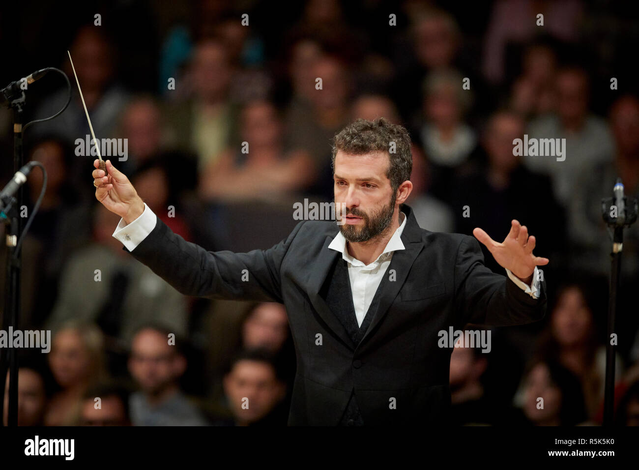 Israeli conductor Omer Meir Wellber becomes chief conductor of the BBC Philharmonic Orchestra, performing at  the Bridgewater Hall is Manchester Stock Photo