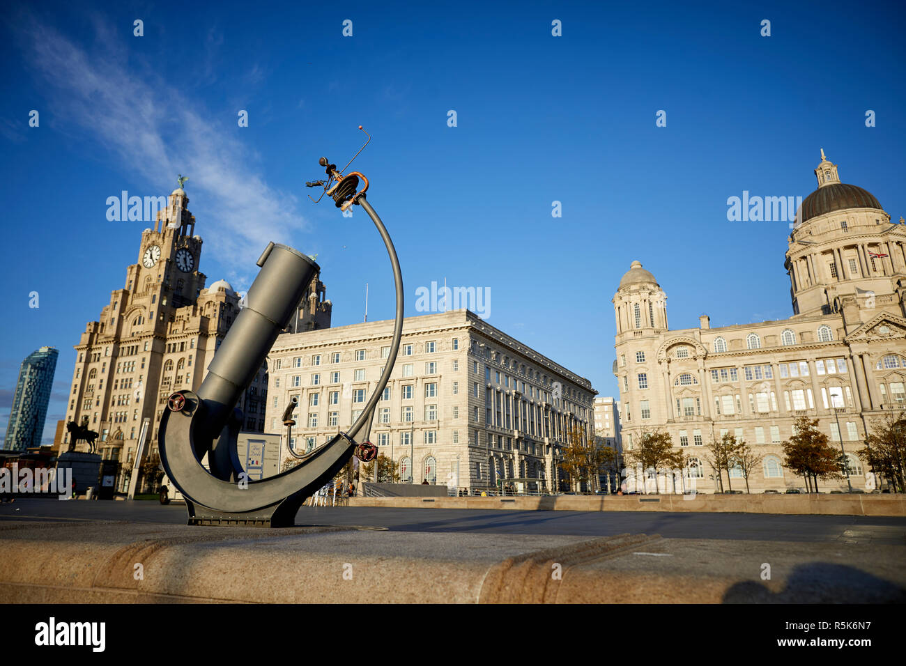 Pier Head Liverpool Waterfront rating in the public tourist traction area  with Heaven and Earth Telescope and Orrery sculpture Designed by Andy Plant Stock Photo