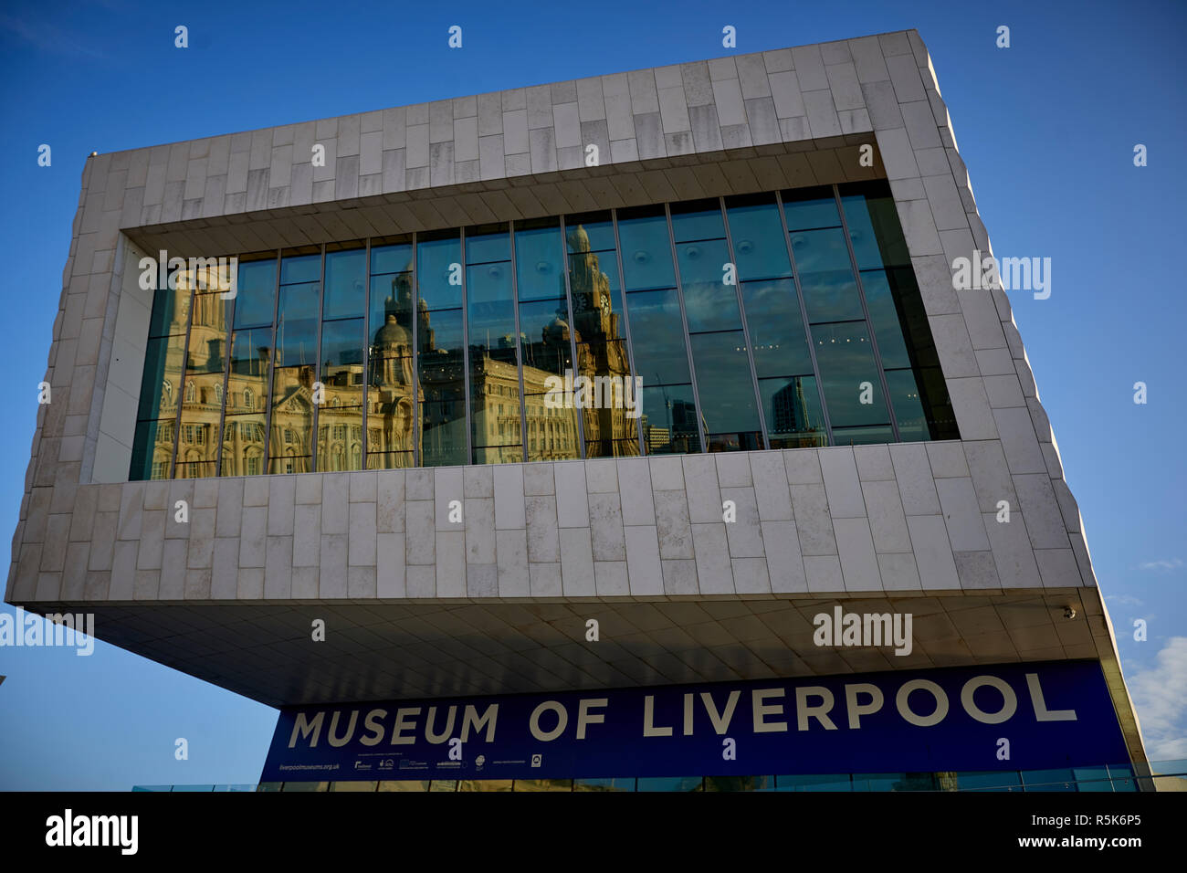 Pier Head Liverpool Waterfront Museum of Liverpool  reflection in window Port Of Liverpool Building and Liver Building Stock Photo