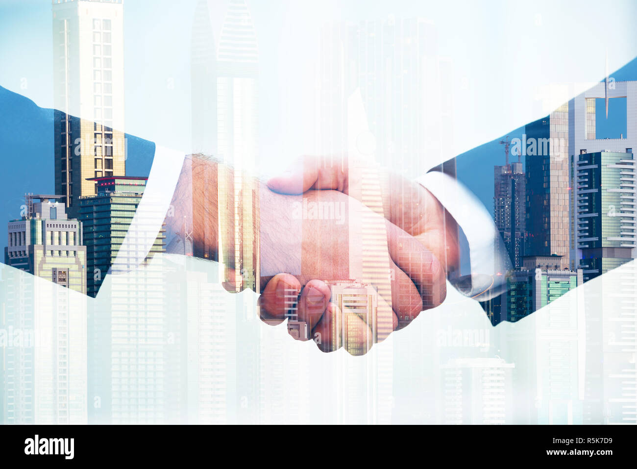 Businessmen Shaking Hands Stock Photo