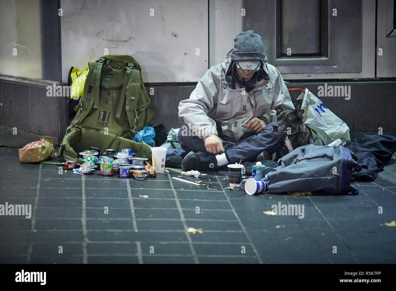 Liverpool city centre homeless begging man with mess around him as he begs Stock Photo