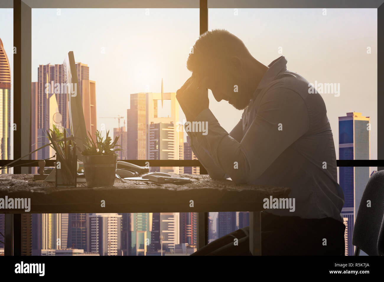 Businessman Suffering From Headache Stock Photo