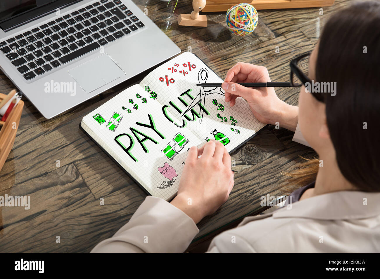 Woman Drawing Salary Paycut Stock Photo Alamy