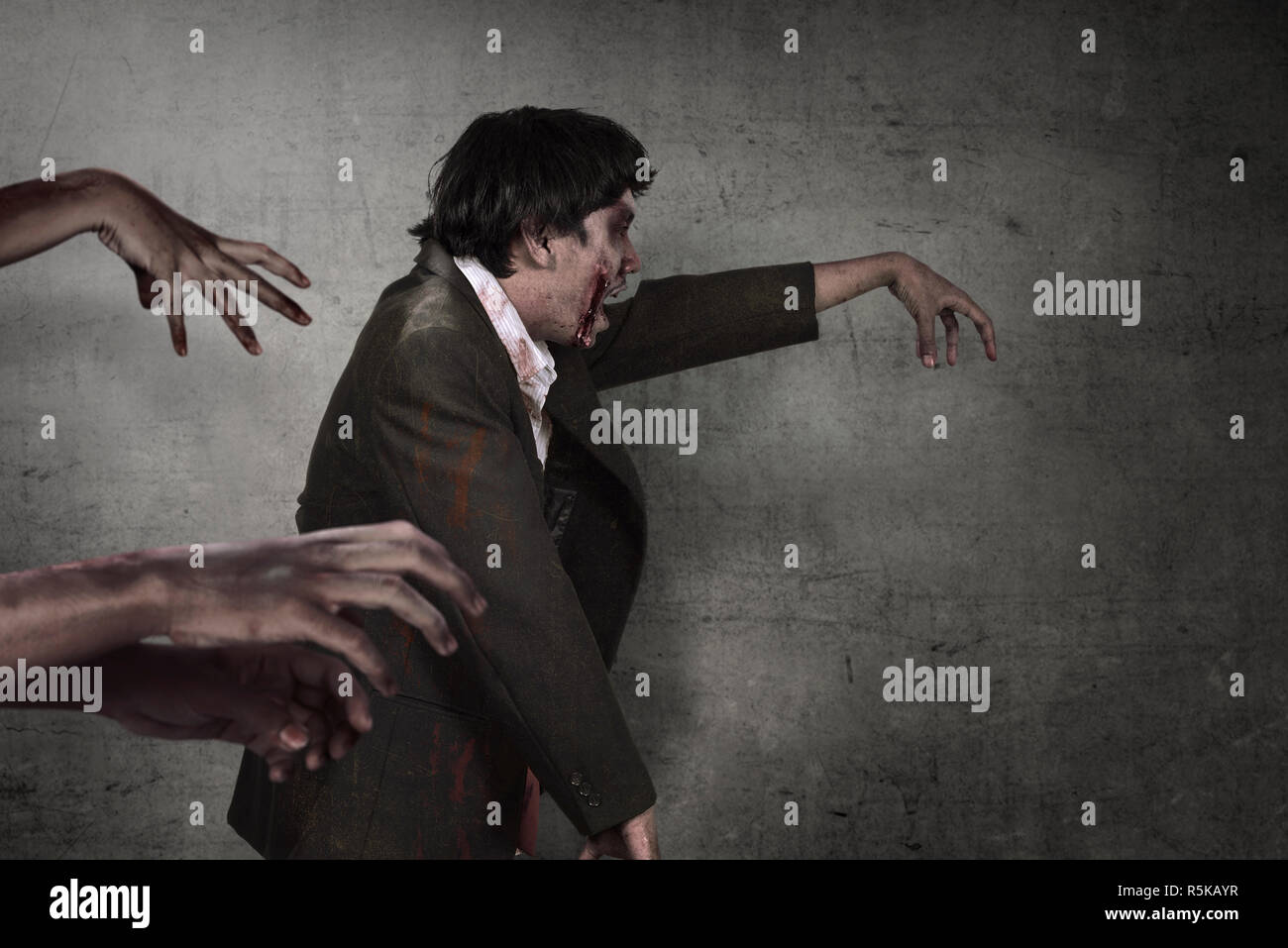 Aggressive asian zombies man with bloody hand walking Stock Photo Alamy