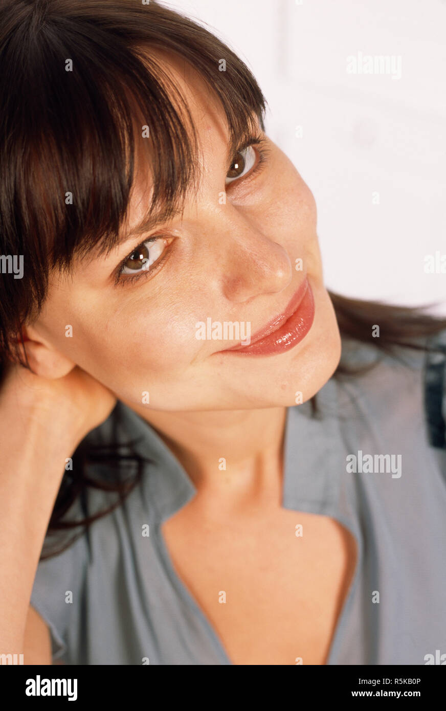 Close up young woman blue hi-res stock photography and images - Alamy
