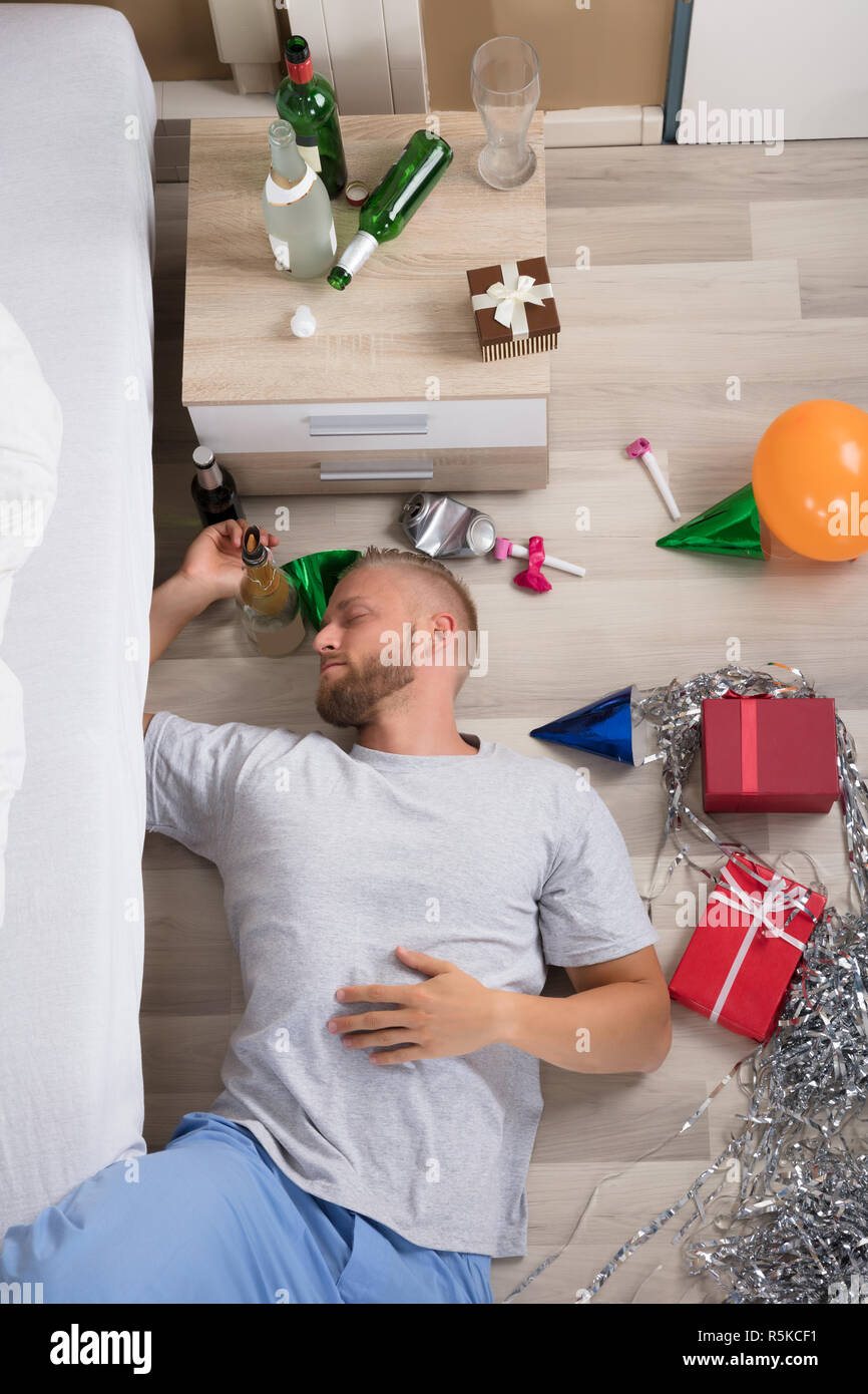 Man Sleeping On Hardwood Floor Stock Photo Alamy