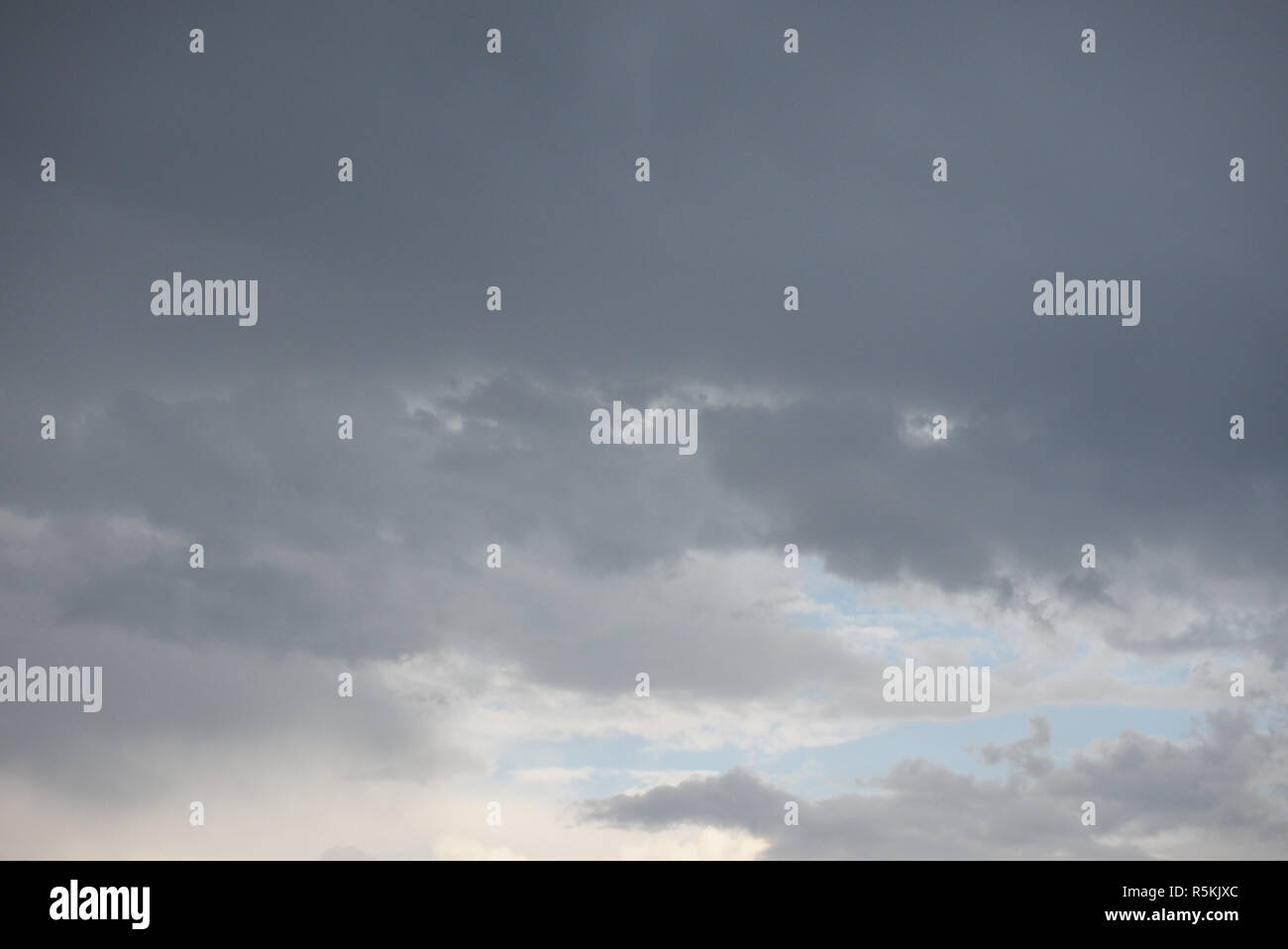 dark blue sky with clouds background Stock Photo - Alamy