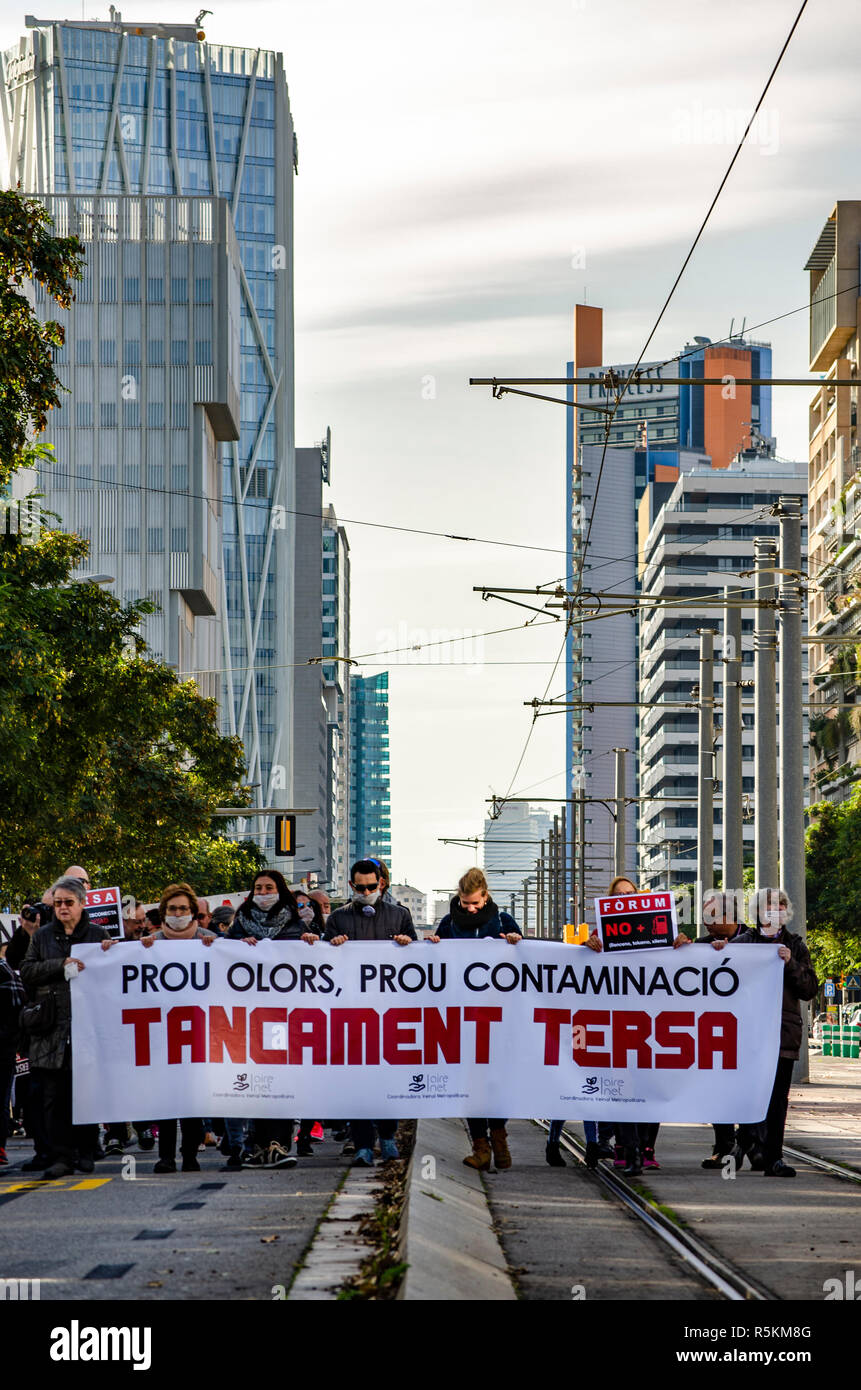 Demonstrators seen holding a banner during the protest. Some 300 residents affected by the bad smells and air pollution of the Tersa public incineration plant manifested  demanding that the City Council of Barcelona definitively closes the incinerator plant. Tersa incinerates garbage and generates electricity. Stock Photo