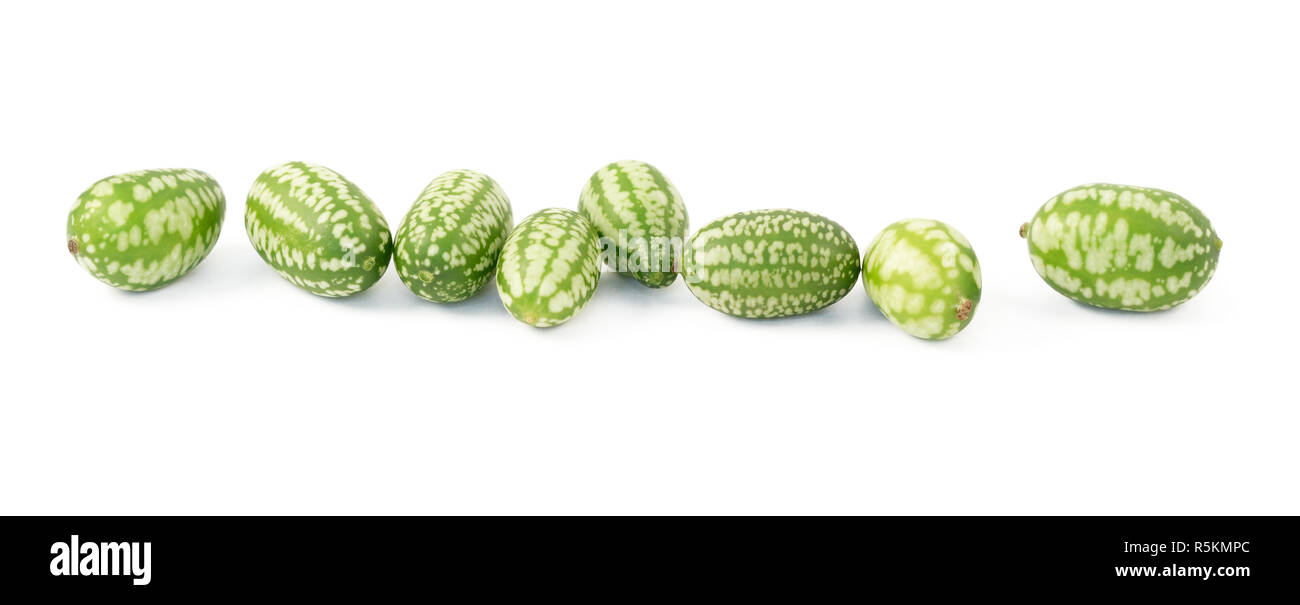 Row of eight cucamelons Stock Photo