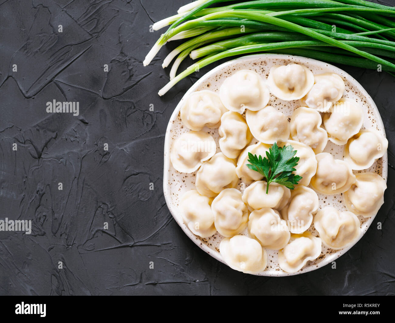 Russian pelmeni, ravioli, dumplings with meat Stock Photo - Alamy