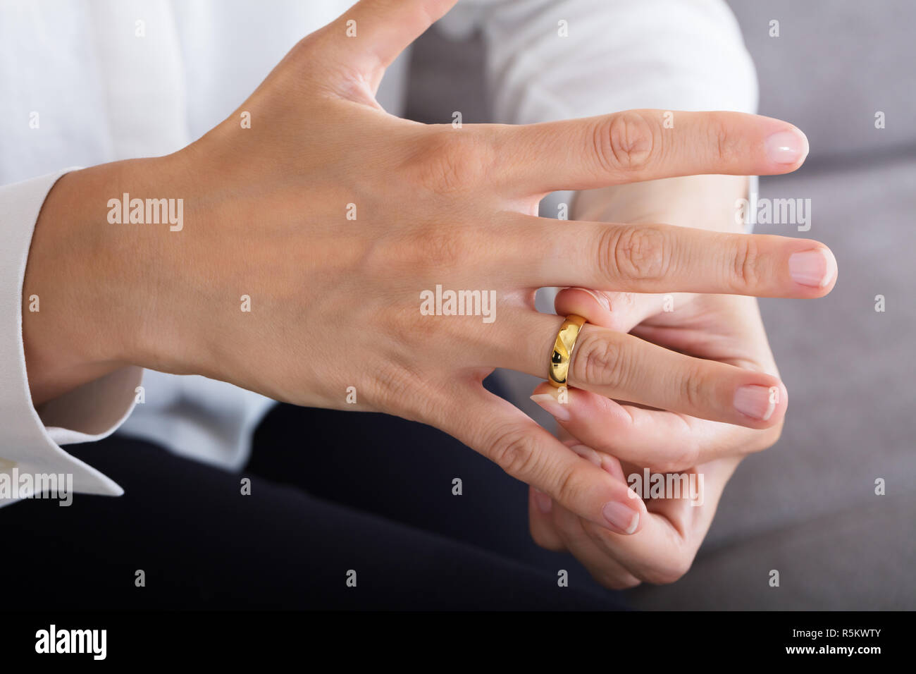 Woman removing ring wedding hi-res stock photography and images - Alamy