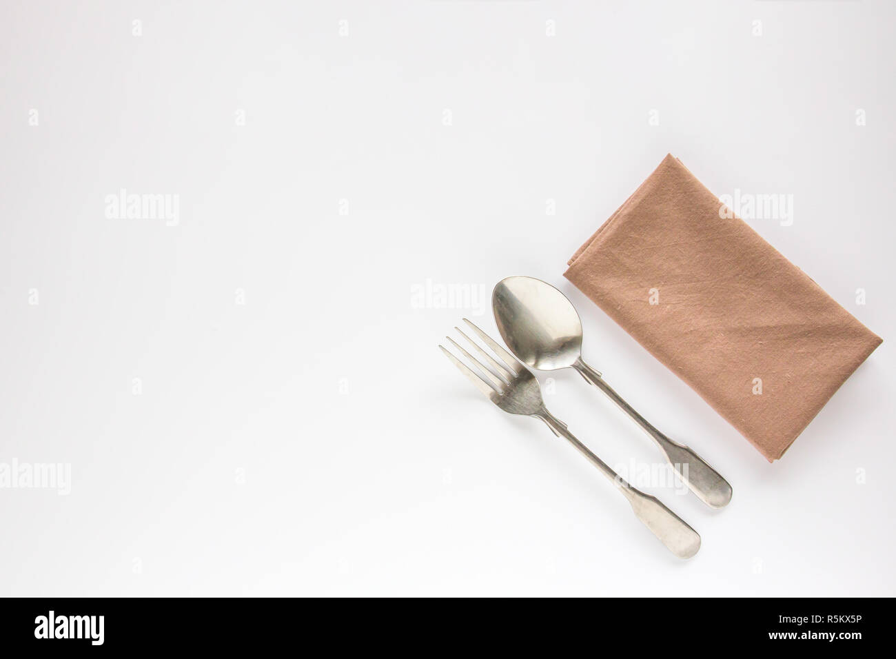 Download Blank Brown Restaurant Napkin Mockup With Spoon And Fork Stock Photo Alamy