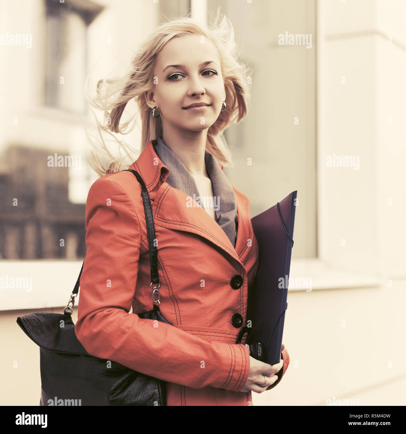 fashion business woman with file folder 