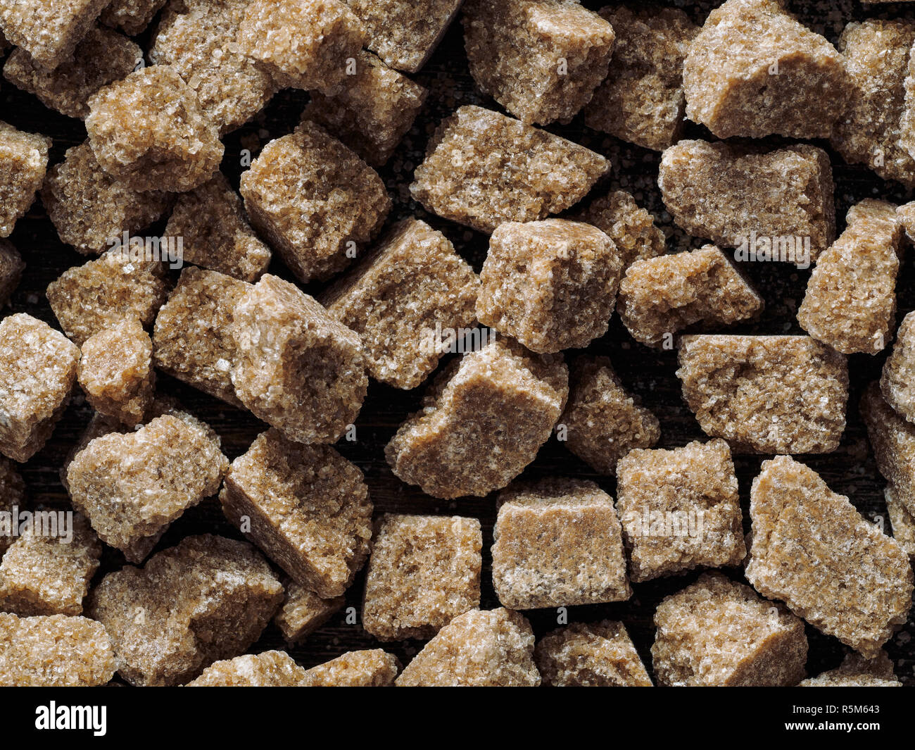 Rushy raw sugar cubes close up Stock Photo