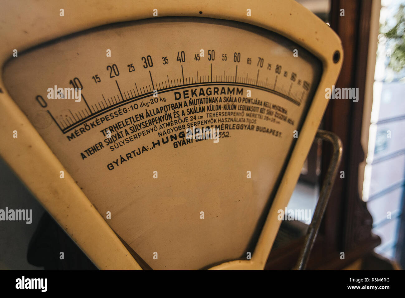 Vintage golden weighing scales as a part of restautant interior Stock Photo