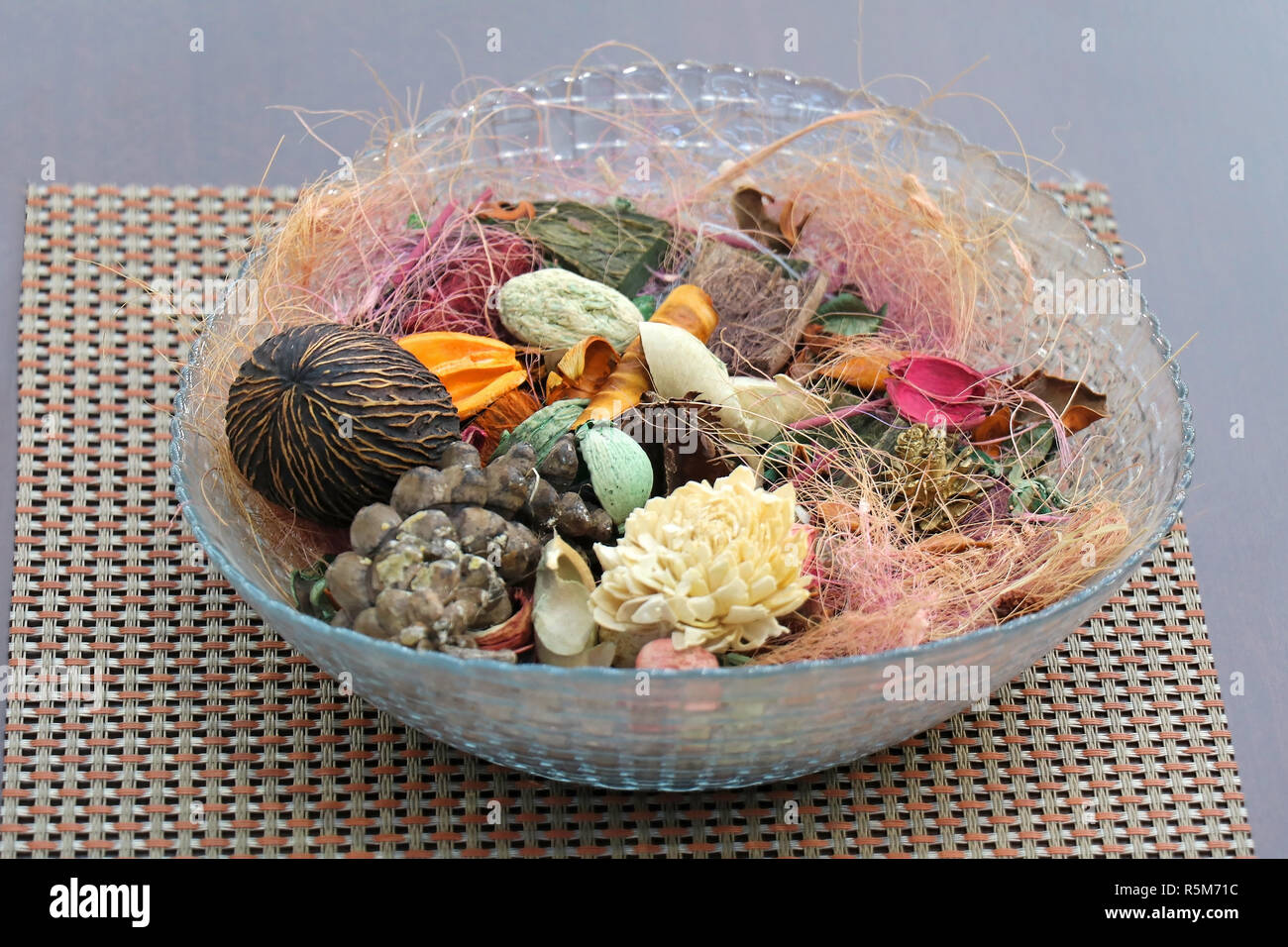 Pile of colorful potpourri in glass bowl as home decor Stock Photo