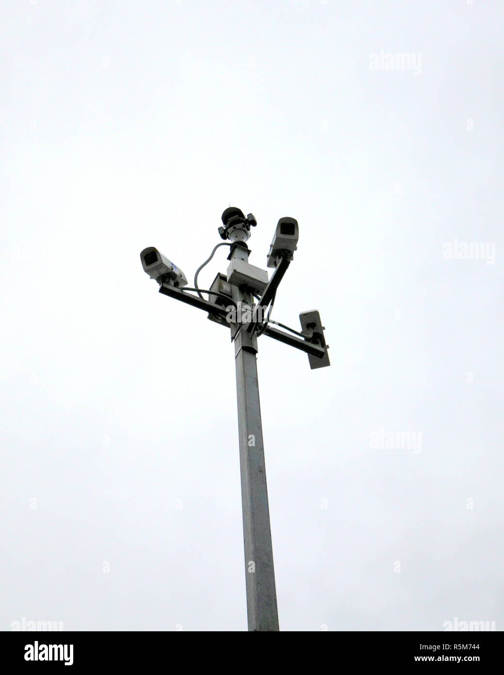 surveillance  security video cameras on a pole Stock Photo