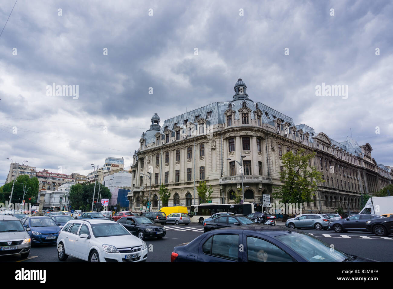 September 22, 2017 Bucharest/Romania - Heavy traffic in downtown Bucharest, University of Bucharest (Universitatea din Bucuresti) in the background Stock Photo