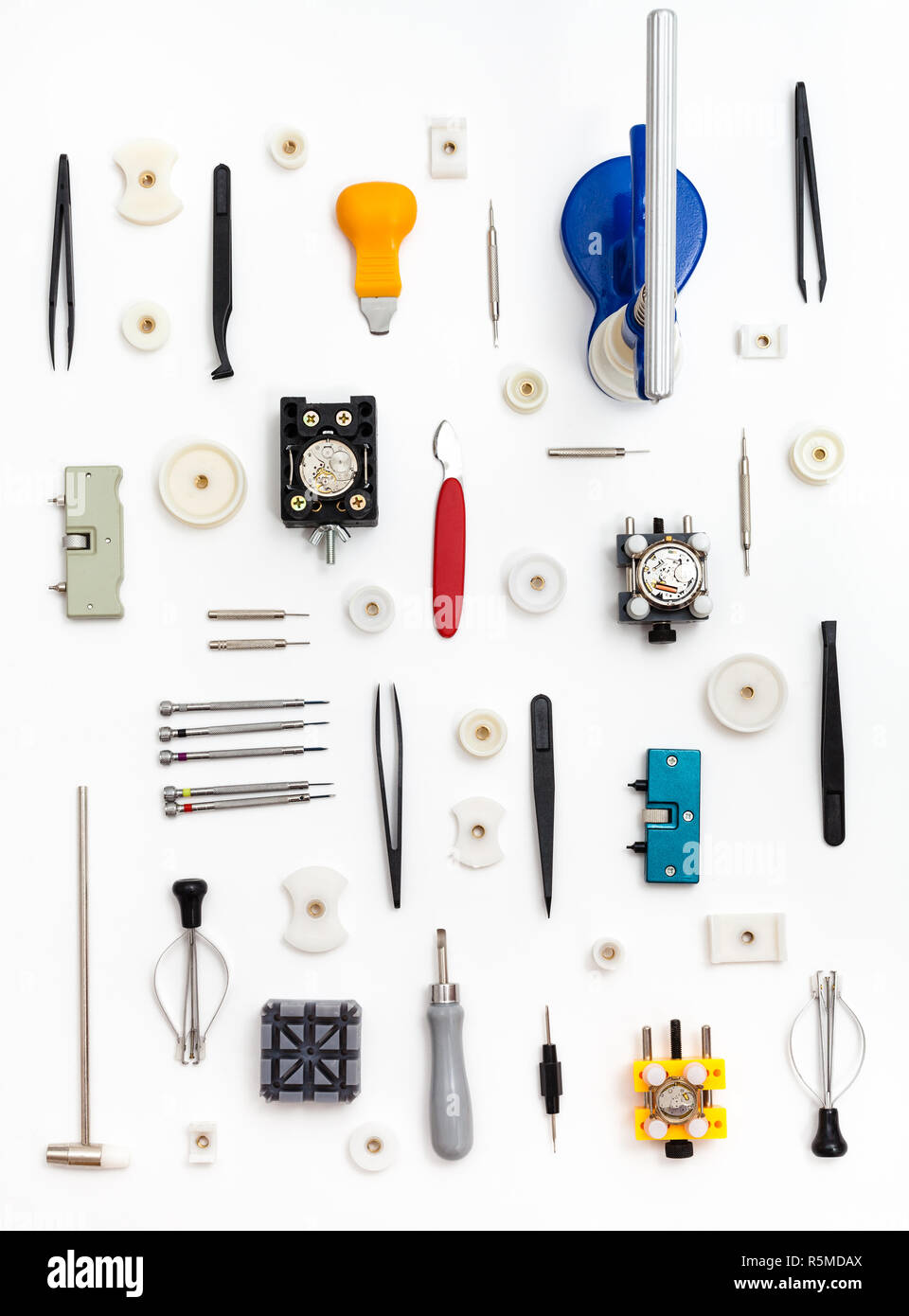 vertical pattern from watch repairing tools Stock Photo