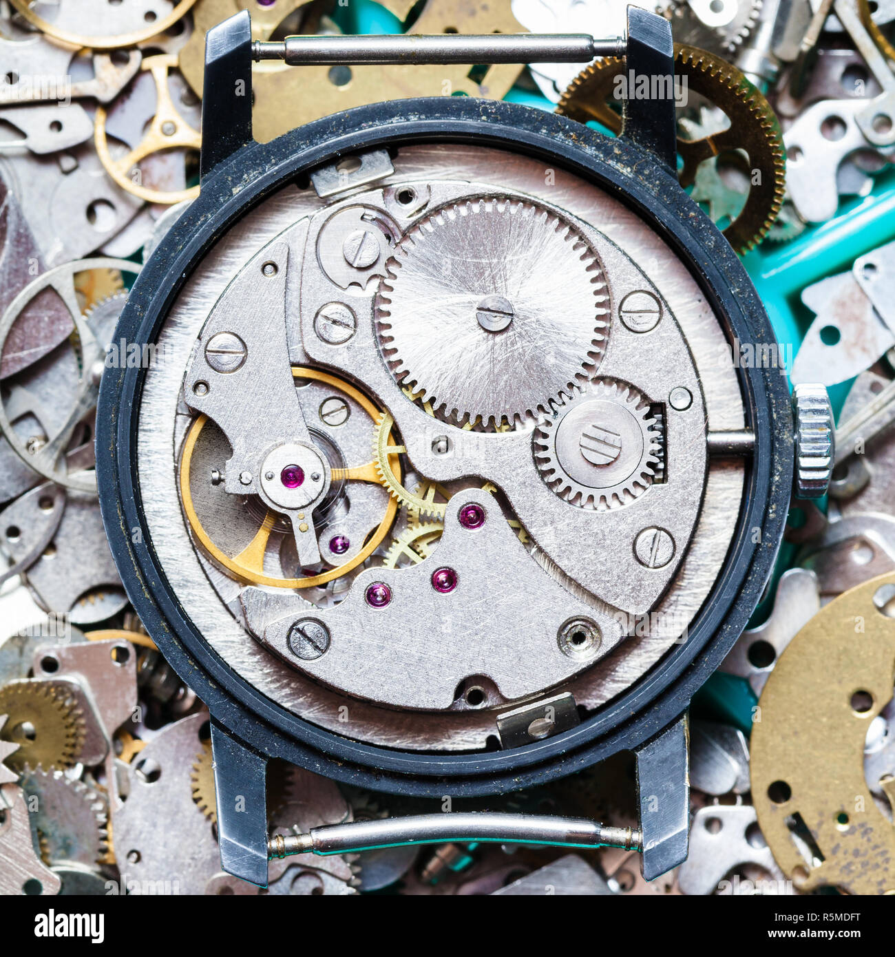 clockwork on heap of clock spare parts Stock Photo Alamy