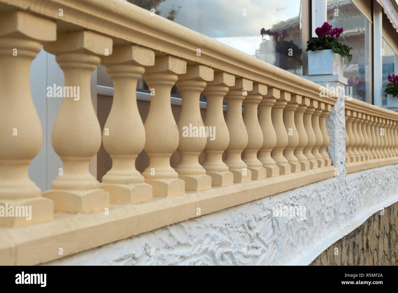Stone balustrade railing in beige Stock Photo