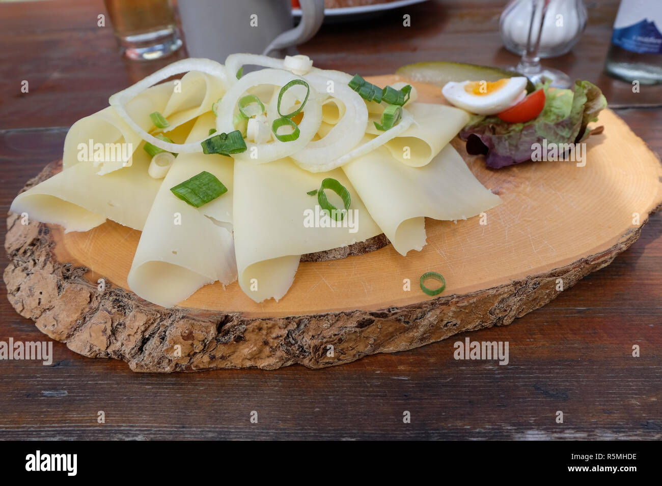 brotzeit with cheese bread and onions and leeks Stock Photo