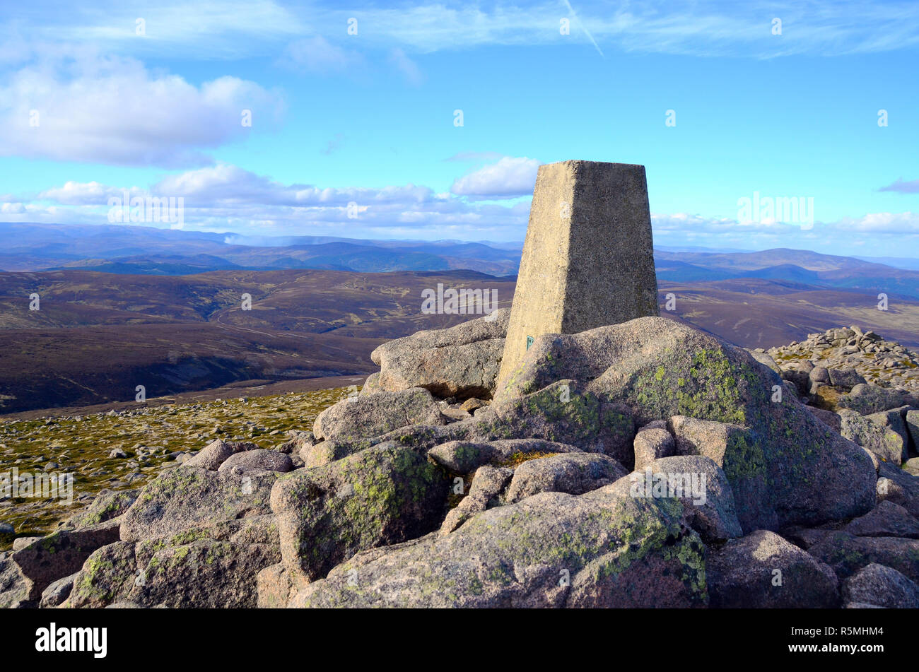 Cairn on the top of mount keen in glen Esk , Angus, looking towards the cairngorms in the highlands Stock Photo
