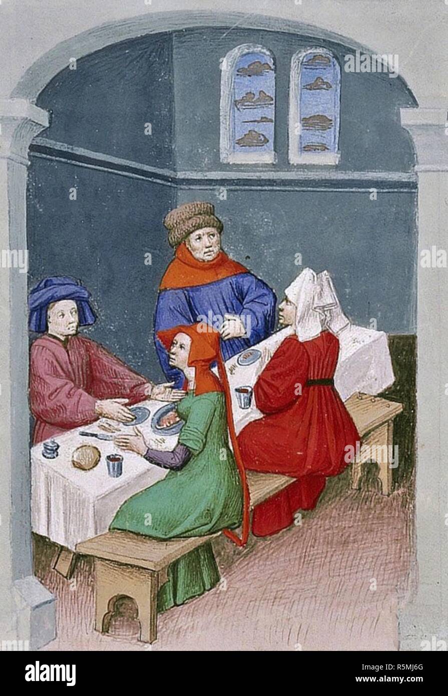 The meal. Miniature from The Decameron by Giovanni Boccaccio. Museum: BIBLIOTHEQUE NATIONALE DE FRANCE. Author: ANONYMOUS. Stock Photo