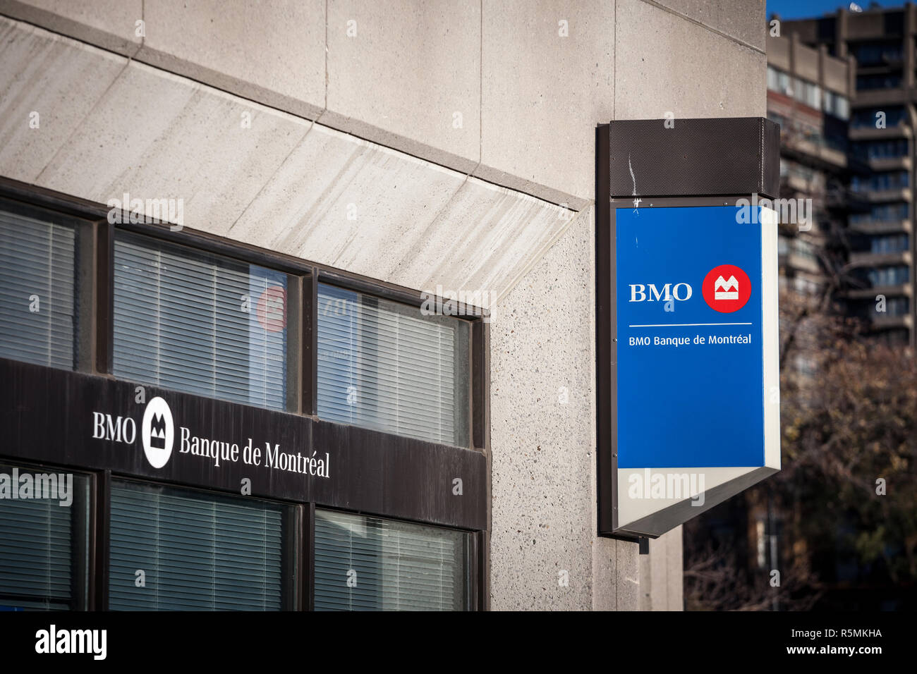 MONTREAL, CANADA - NOVEMBER 4, 2018: Bank of Montreal logo, known as BMO, in front of one of their branch. Called as well banque de Montreal, it is on Stock Photo