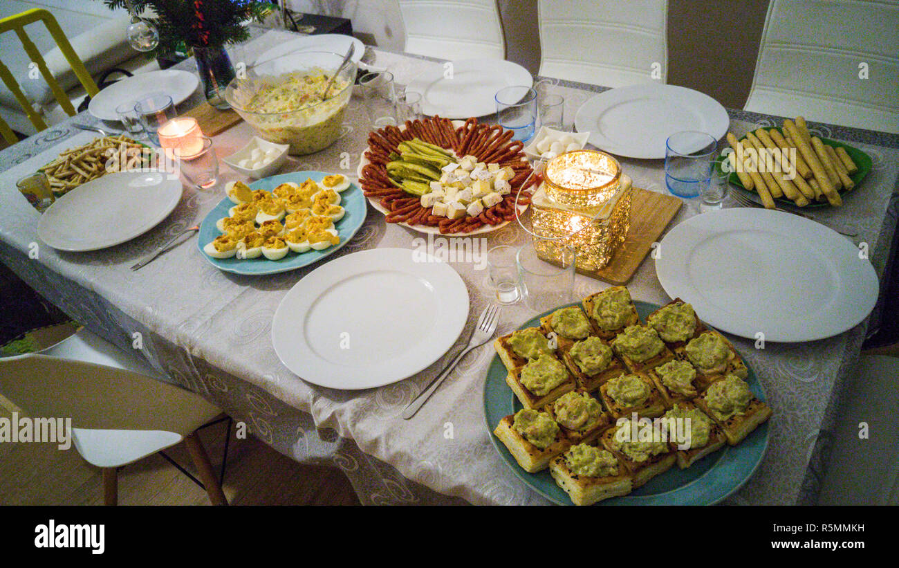 Traditional New Years feast. Decorated table with different kinds of ...