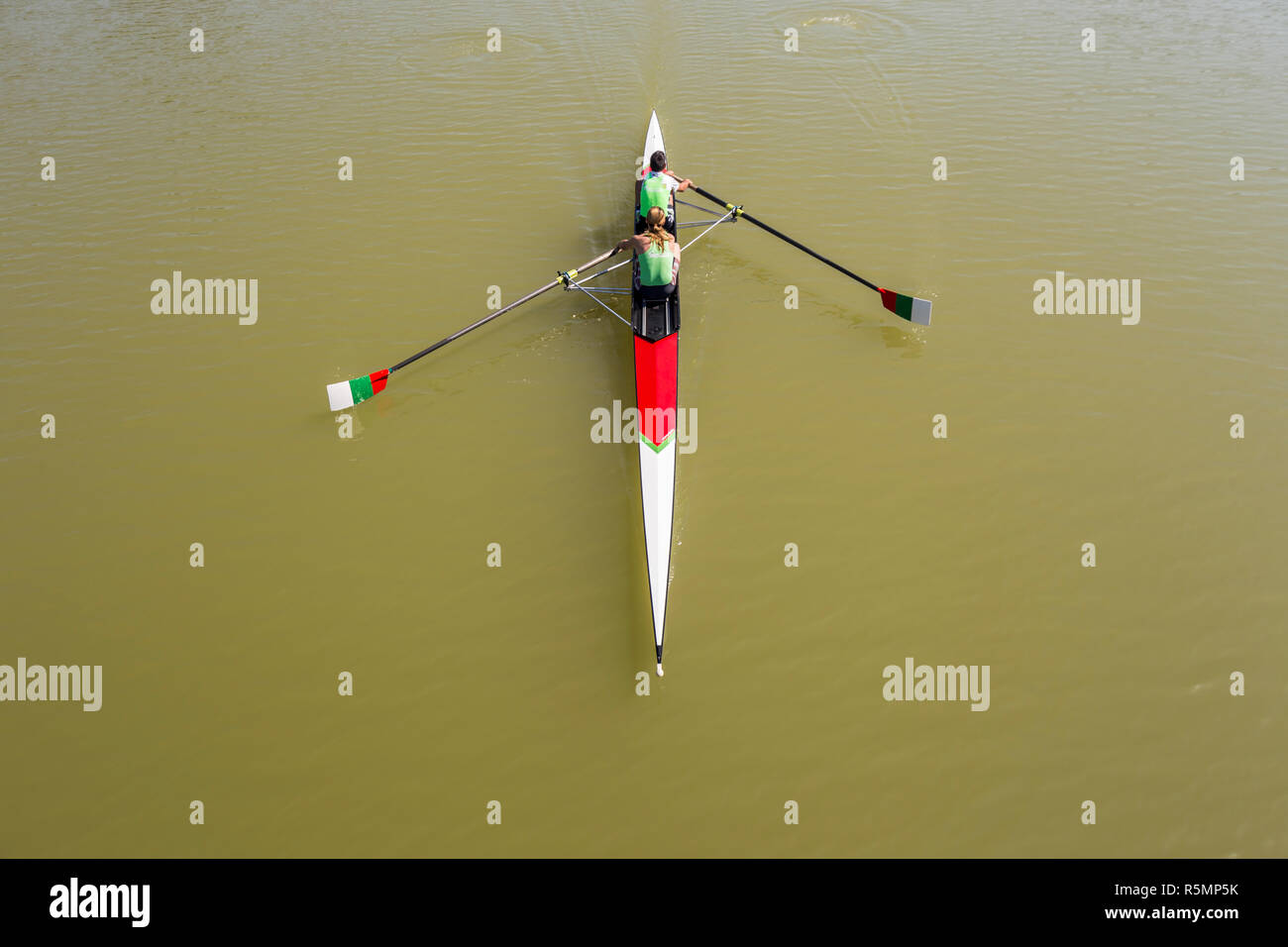 Aerial view team rowing on water hi-res stock photography and images ...