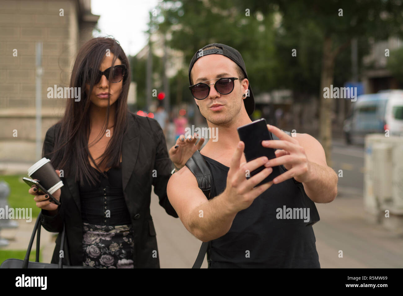 Young couple taking selfies Stock Photo