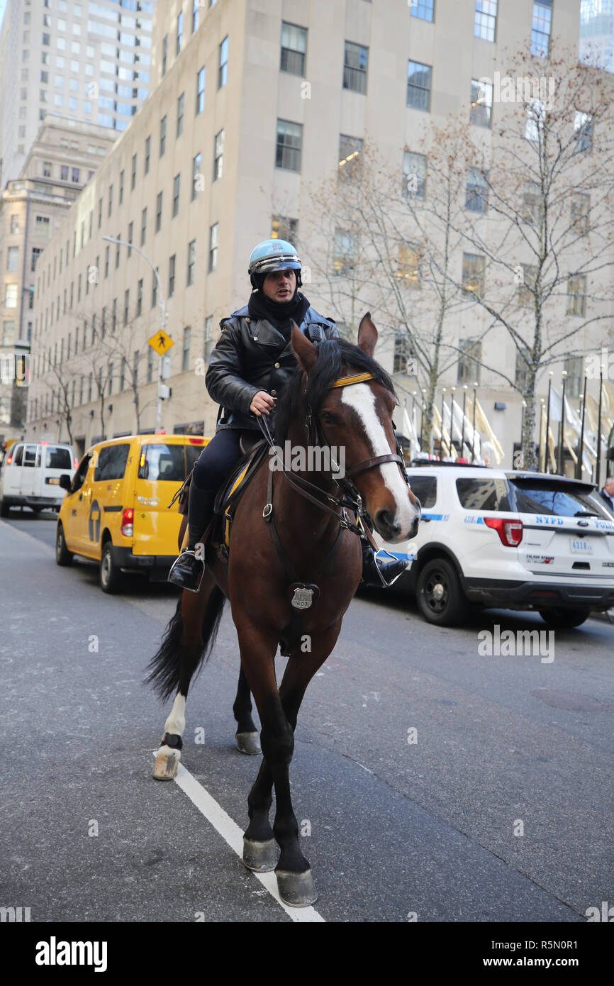 NYPD Mounted Unit police officer provides security at Rockefeller Plaza