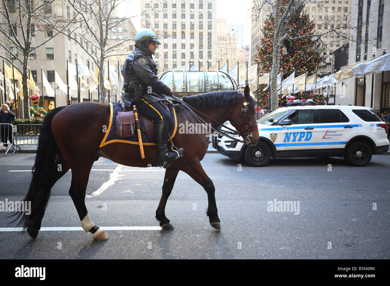 NYPD Mounted Unit police officer provides security at Rockefeller Plaza