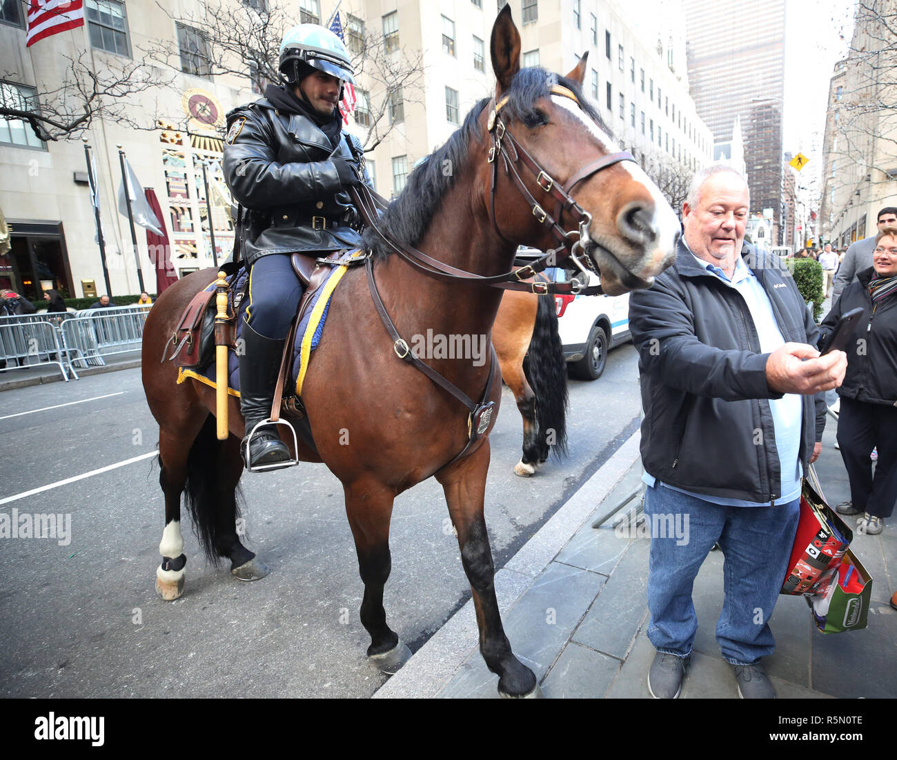 NYPD Mounted Unit police officer provides security at Rockefeller Plaza