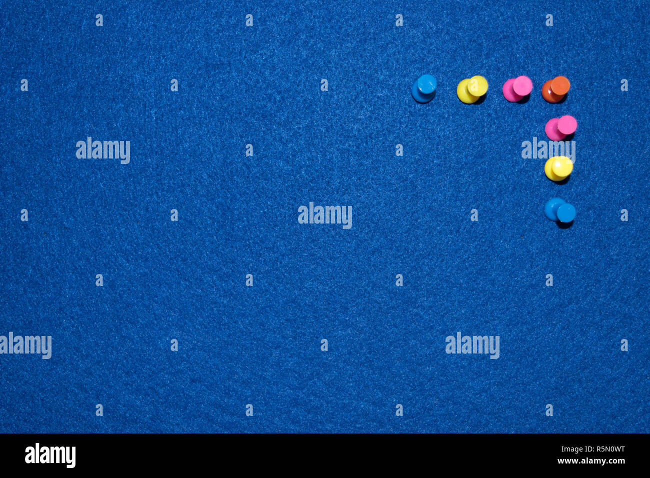 Colored pins on a board Stock Photo - Alamy