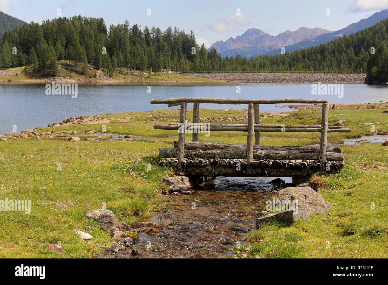 boardwalk at the weiÃŸbrunnsee lago fontana bianca in south tyrol Stock Photo