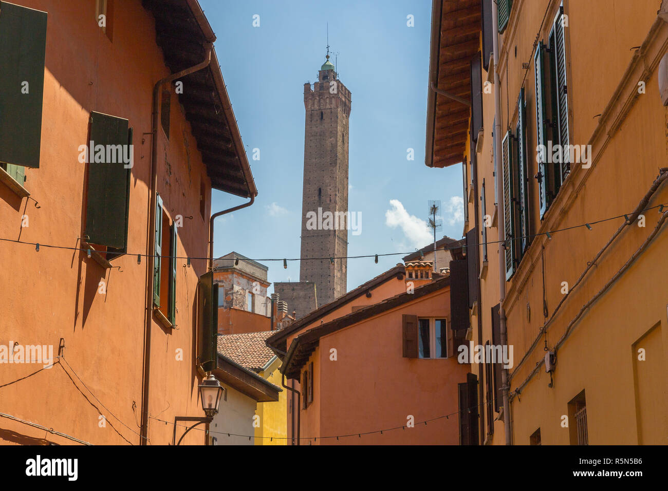 streets of bologna emilia romagna italy with a view of the two towers Stock Photo