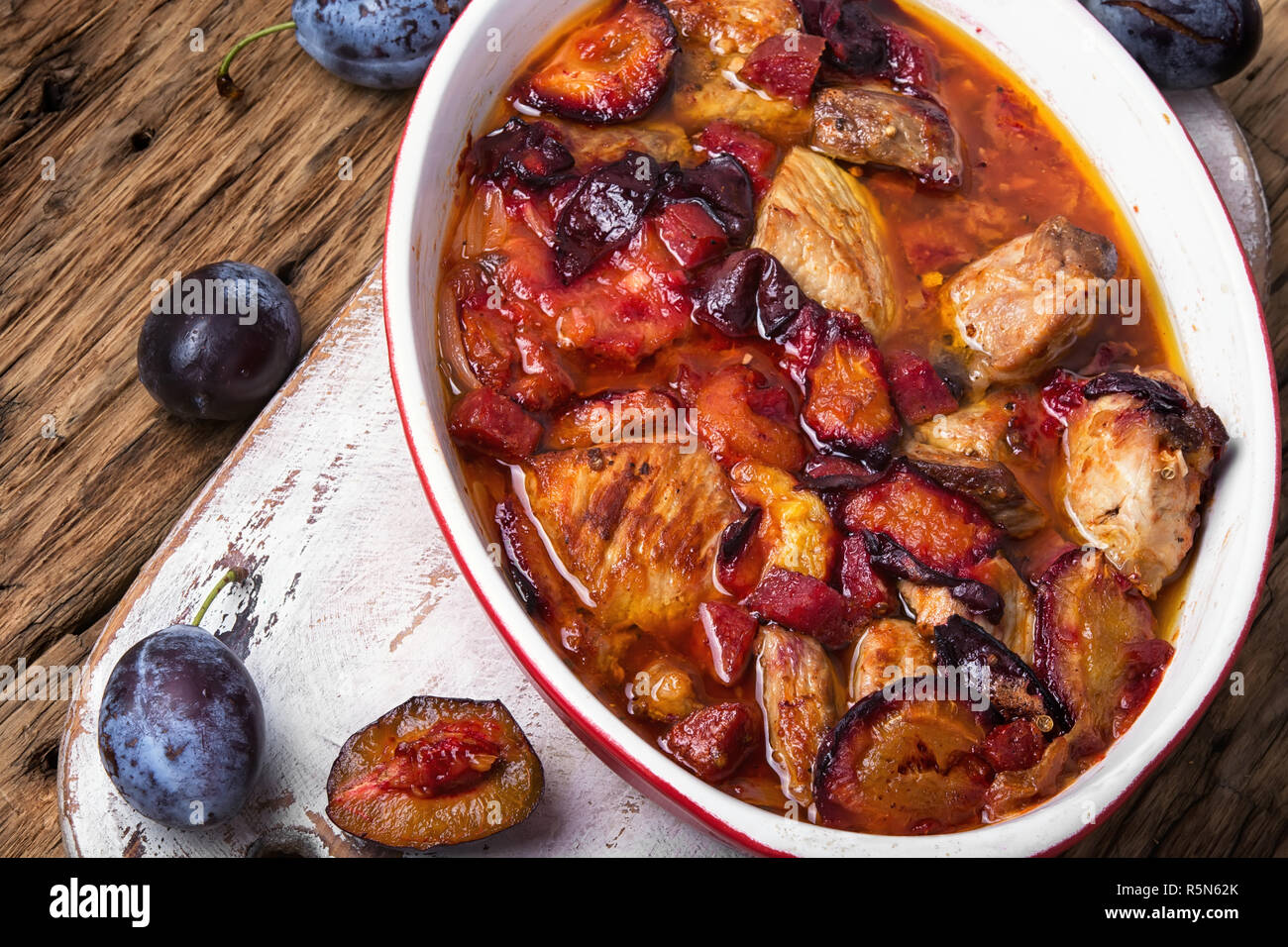meat in plum sauce Stock Photo Alamy