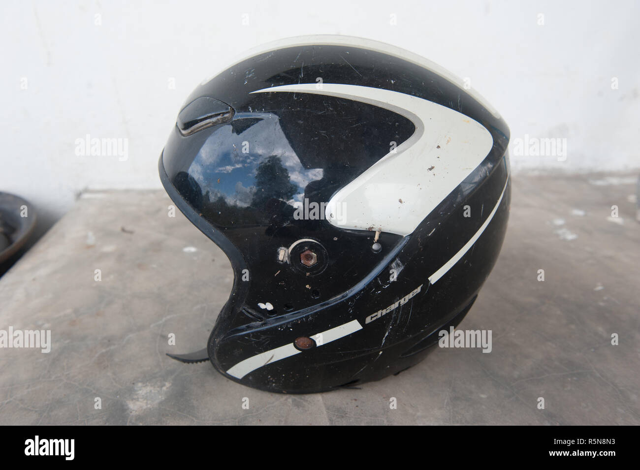 Old broken helmet Stock Photo