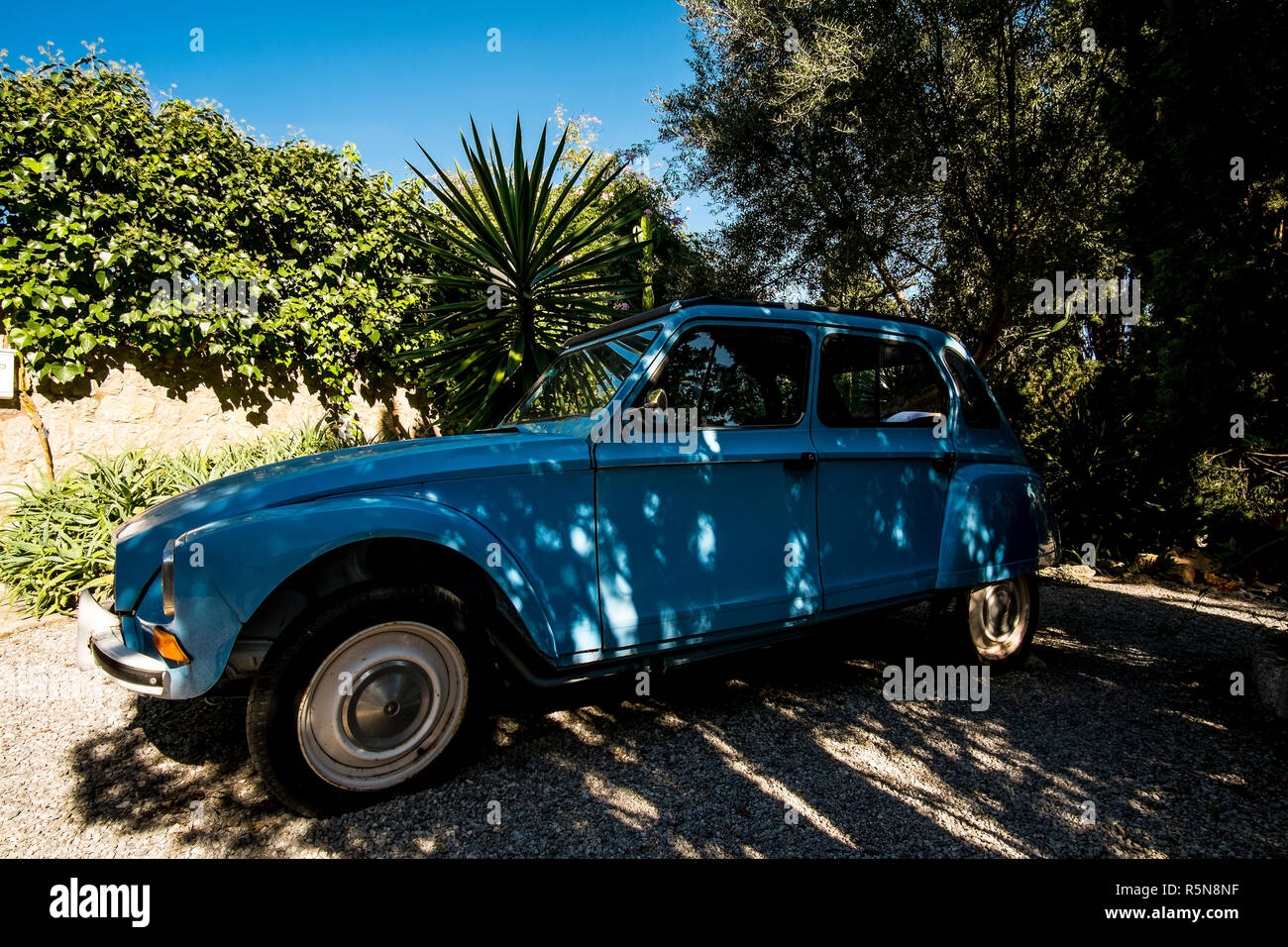 A blue Citroen Dyane car parked near the top of the Carrer del Calvari in Pollenca, Mallorca Stock Photo
