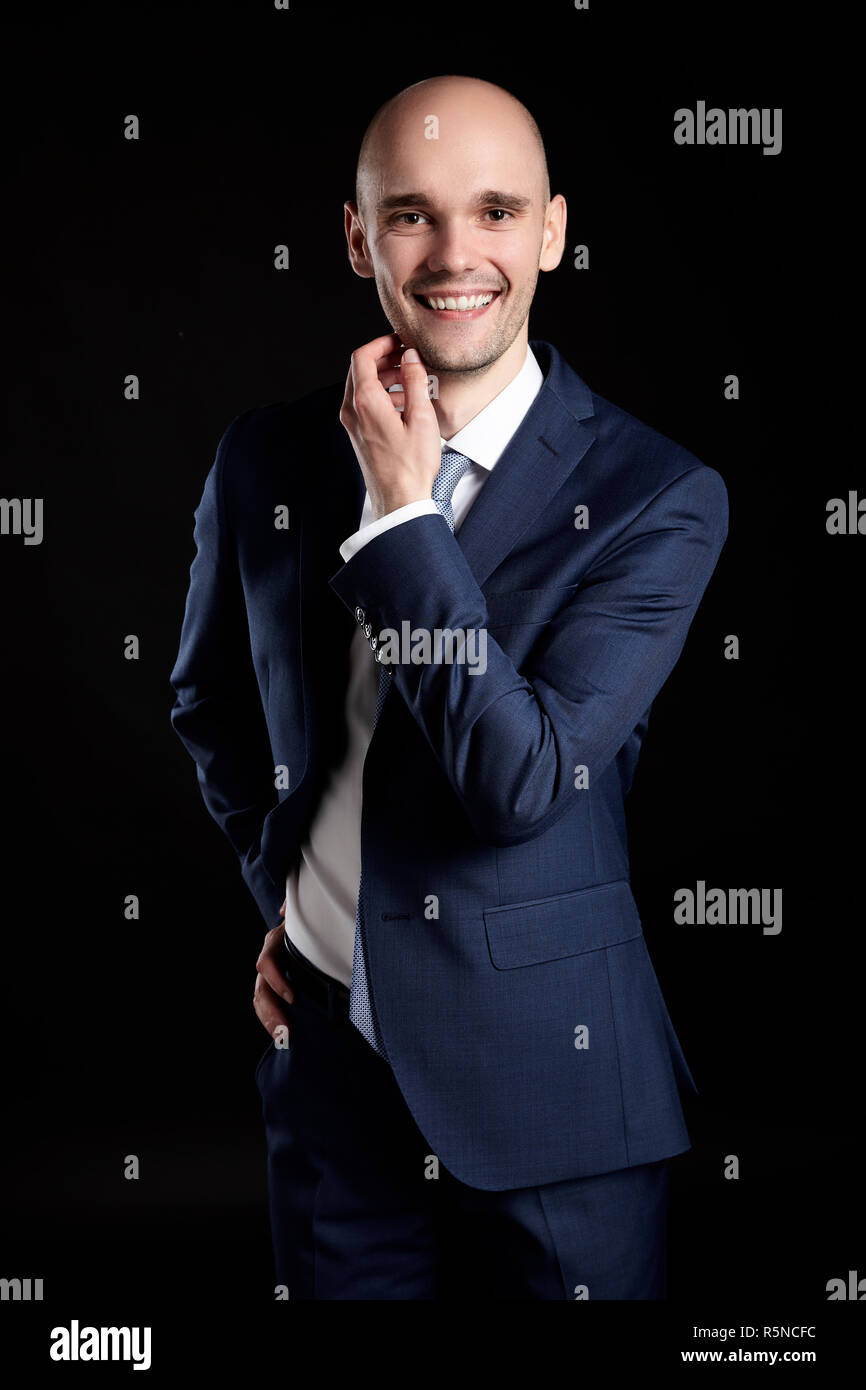 Handsome Man Stroking his Chin Stock Photo