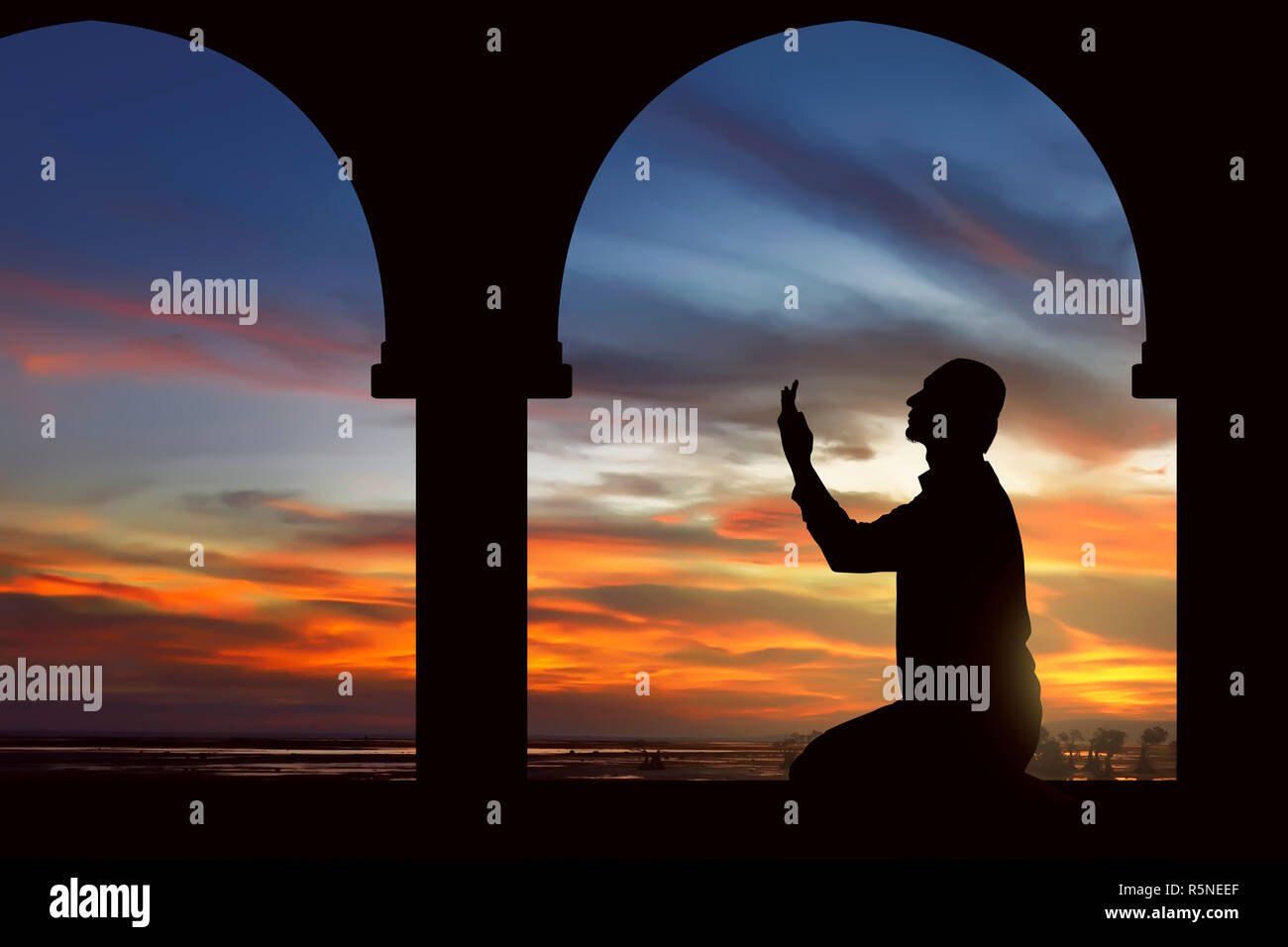 Image of silhouette man praying Stock Photo - Alamy