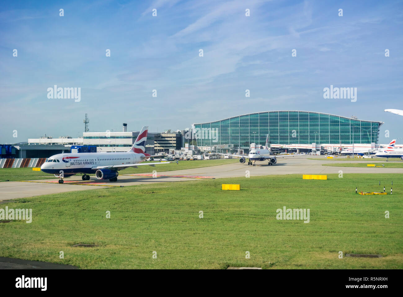 September 24, 2017 London/UK - British Airways airplanes leaving Terminal 5, Heathrow Airport Stock Photo
