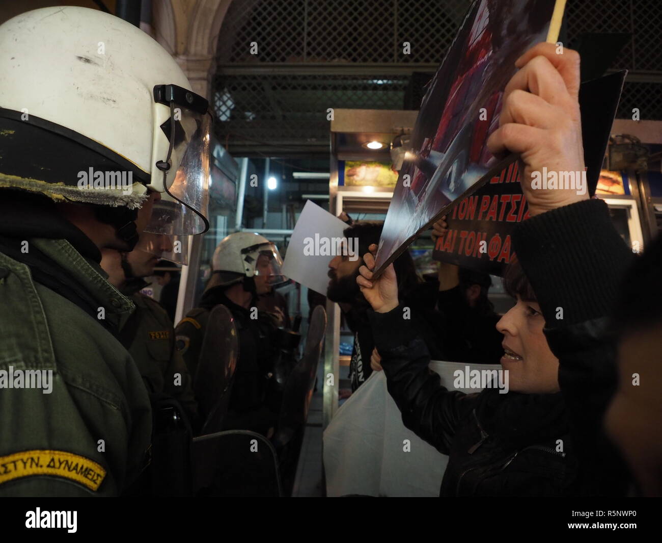 Athens, Greece. 01st Dec, 2018. Demonstators face off with riot police ...